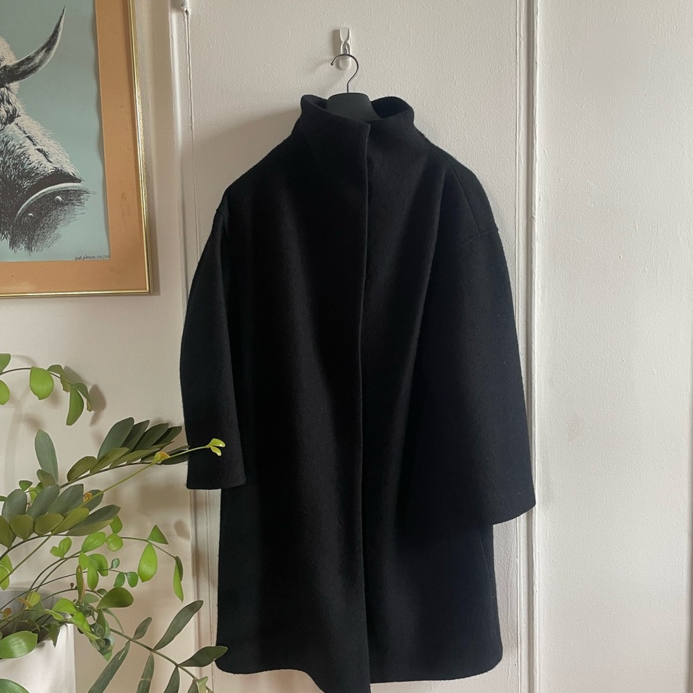 COS black wool coat with funnel neck, zip, and clasp, size S; would also fit M
